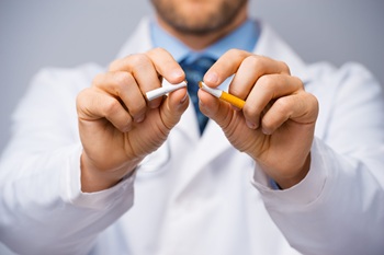 Doctor showing that smoking is bad for your health